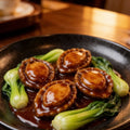Braised abalone with greens